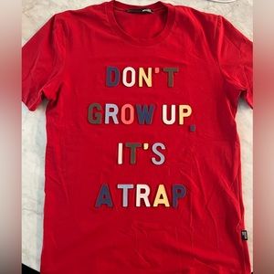 Great condition worn once Love Moschino shirt with raised letters.